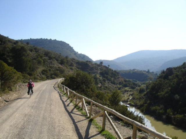 Via Verde de la Sierra dirt road alongside river