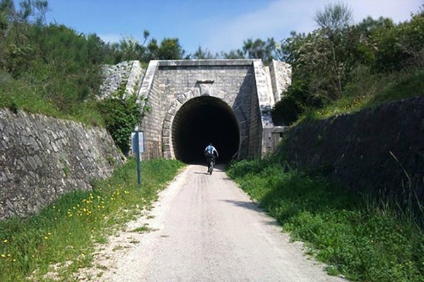 Via Verde del Aceite riding through tunnels