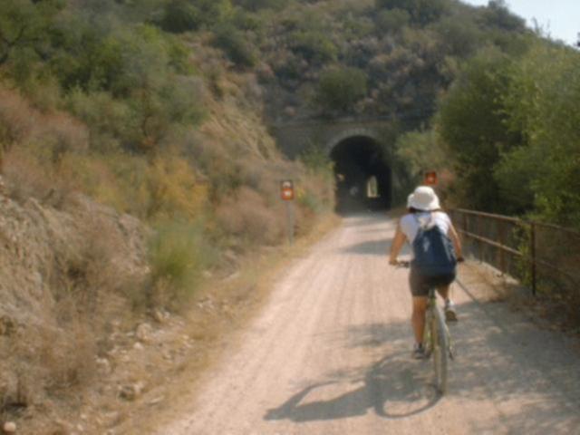 Via Verde de la Sierra riding through tunnels
